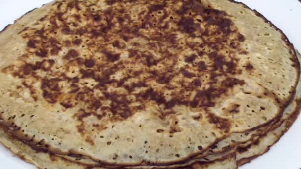 Freshly baked pancake to go to a stack with pancakes. Carnival. Close-up. Macro. — Stock Video