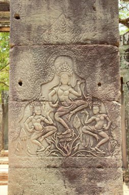 Bayon temple angkor thom, angkor wat, siem reap cambodia carving on the wall clipart