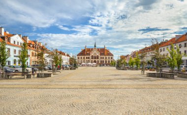 Market square in Pisz with the historic town hall, Masuria, Poland. clipart