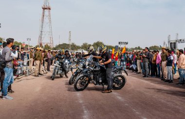 Bikaner, Rajasthan / India - January 2019 :  Bikers group performing their biking activities during the opening ceremony of Bikaner camel festival