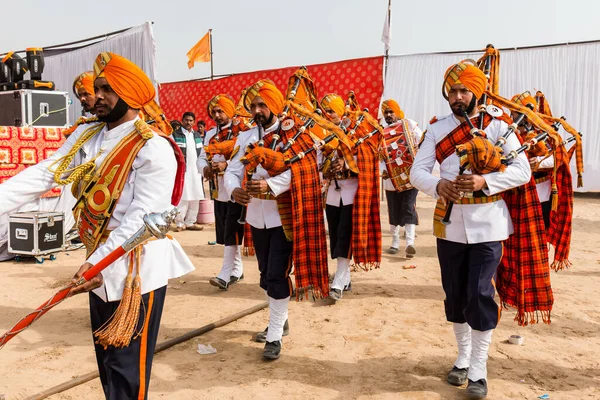 stock image Bikaner, Rajasthan / India - January 2019 :  Bangpiper band performing at bikaner camel fair ground which is lead by sikh sgroup