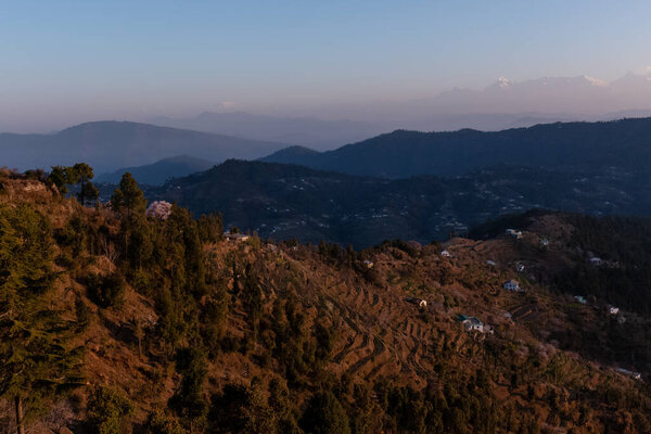 Snow covered mountains scenic view with layers of mountains at uttrakhand