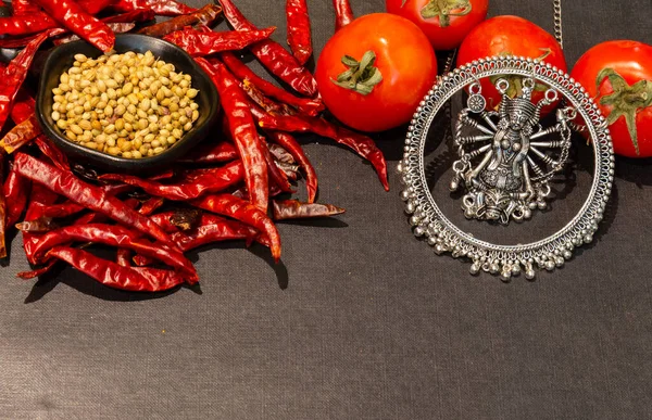 Indian Spices and herbs with Indian Ethnic Jewellery with black wooden background