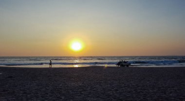 Goa sahilinde güzel bir gün batımı