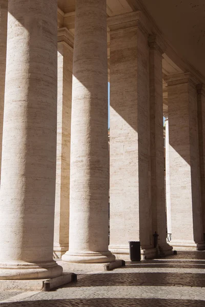 Beautiful ancient columns with shadow in Vatican, Italy