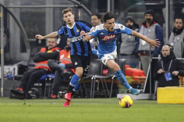 Milan, Italy - 12/02/2020: Coppa Italia - Inter vs Napoli 0-1. Eljif Elmas, Napoli, and Nicol Barella, vie for the ball.