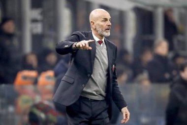 MILAN, ITALY - FEBRUARY 13, 2020: Stefano Pioli, head coach of AC Milan, looks on prior to the Coppa Italia semi final football match between AC Milan and Juventus FC.