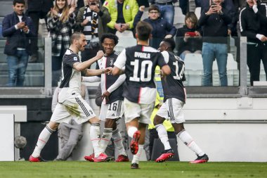 TURIN, ITALY - FEBRUARY 16, 2020:Players of Juventus celebrating the goal of Juan Cuadrado.
