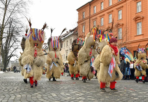 Traditional carnival on shrove Saturday with traditional figures, known as kurent or korent in Ljubljana, Slovenia — Stock Photo, Image