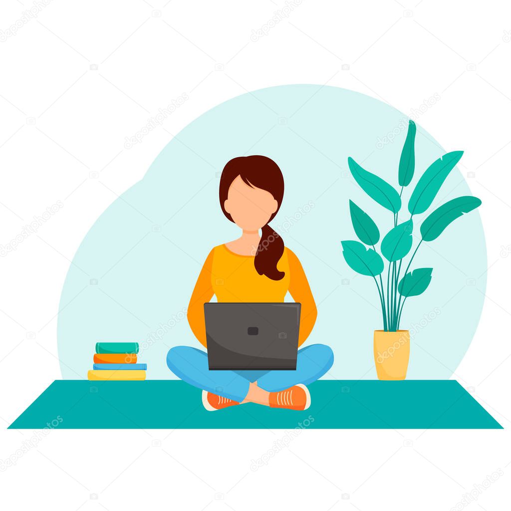 Woman with a laptop sits on the carpet. The concept of freelance or online study.