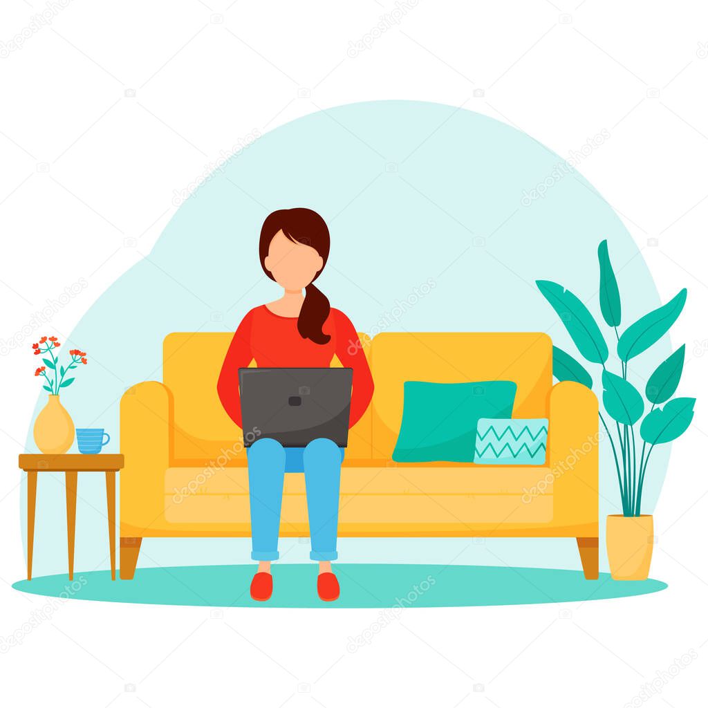 The concept of online studies or freelance, a girl with a laptop works at home sitting on the couch.