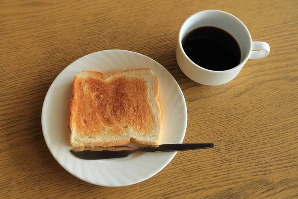 Conjunto de dieta, prato de uma torrada com uma xícara de café preto . — Fotografia de Stock