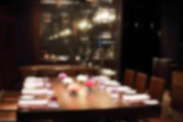 Blurred background of dining table in restaurant. — Stock Photo, Image