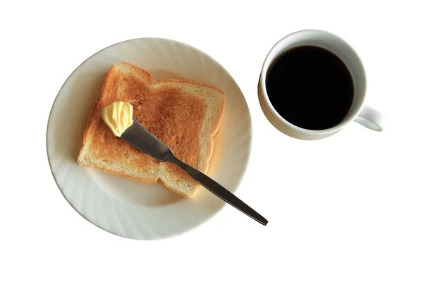 Café da manhã, prato de torrada com manteiga e xícara de café preto, isolado em branco . — Fotografia de Stock