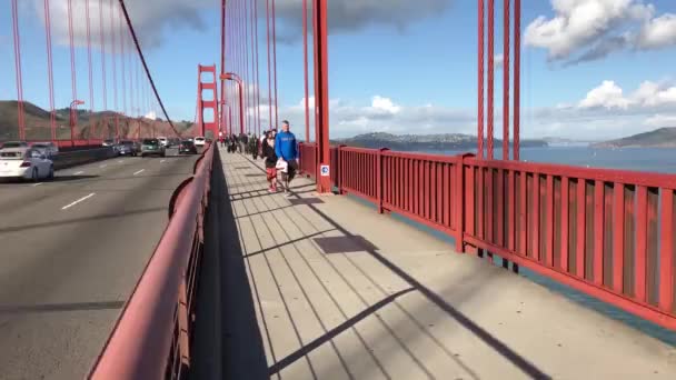 Bike Riders Cross Golden Gate Bridge Nice Day — Stock Video