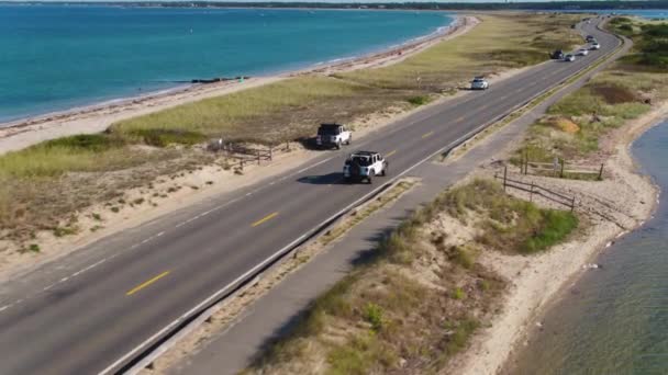 Jeep Driving Road Island Ocean Water Coast Aerial Drone — стоковое видео
