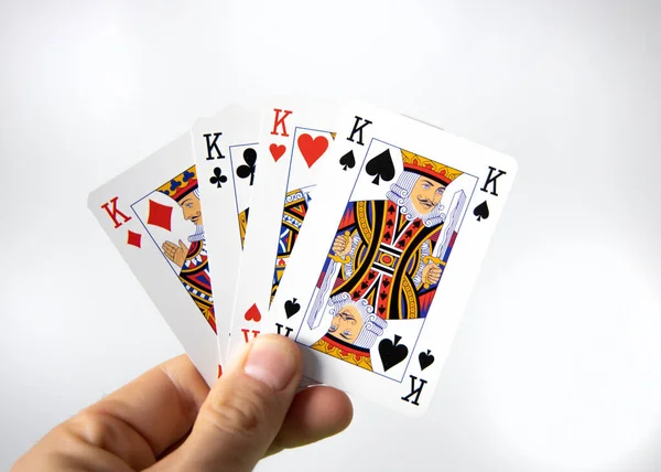 Mão Segurando Vencedor Cartas Poker Sobre Fundo Branco — Fotografia de Stock