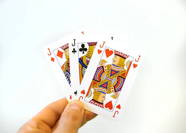 Mão Segurando Trio Cartas Jack Poker Sobre Fundo Branco — Fotografia de Stock