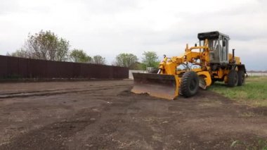 Kovalı sarı buldozer. Tekerlek Yükleyici. Sarı Ön Yükleyici. Ağır Malzeme Makinesi. Traktör ön yükleyicisi. İnşaat Makinesi.