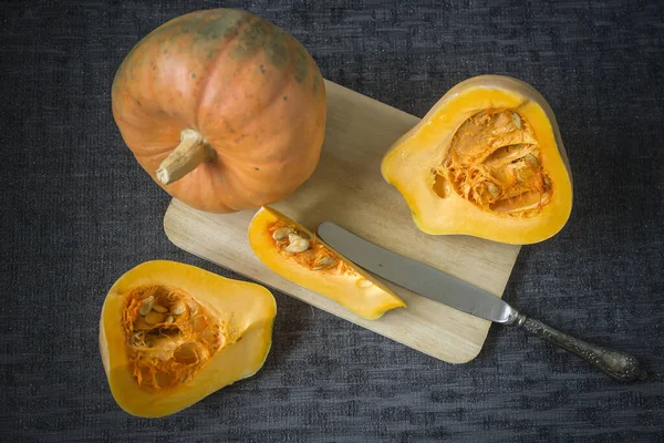 Beautiful Ripe Pumpkins Dark Background Sliced Whole — Stock Photo, Image