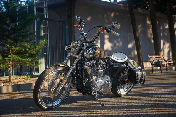 Tbilisi, Georgia - July 16, 2019 - parked Harley Davidson chromed bobber motorcycle