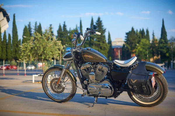 Tbilisi, Georgia - July 16, 2019 - parked Harley Davidson chromed bobber motorcycle