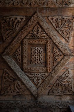 Rabati Castle, Georgia March 17, 2008: Handmade wood crafted door ornament