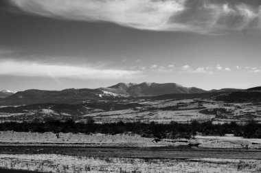 Black and white landscape view of the mountains