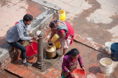 Kathmandu, Nepal February 25, 2018 People getting water from the pump