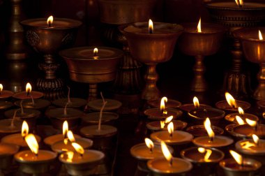 Lit candles at the monkey temple of Kathmandu