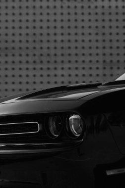 Tbilisi, Georgia August 10, 2019 Black Dodge Challenger parked on the side of the road