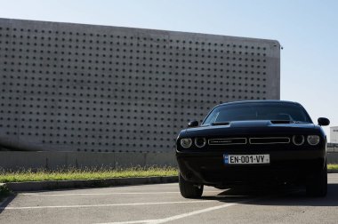 Tbilisi, Georgia August 10, 2019 Black Dodge Challenger parked on the side of the road