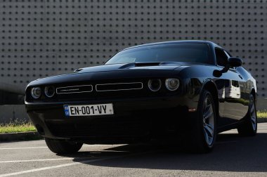 Tbilisi, Georgia August 10, 2019 Black Dodge Challenger parked on the side of the road