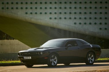 Tbilisi, Georgia August 10, 2019 Black Dodge Challenger parked on the side of the road