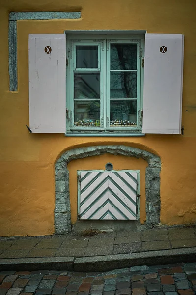 Tallinn, Estonia December 7, 2019 Unique door and window in the old town of the city