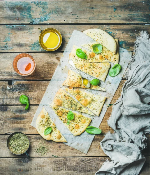 Homemade Italian focaccia flatbread with herbs, olive oil and wine — Stock Photo, Image