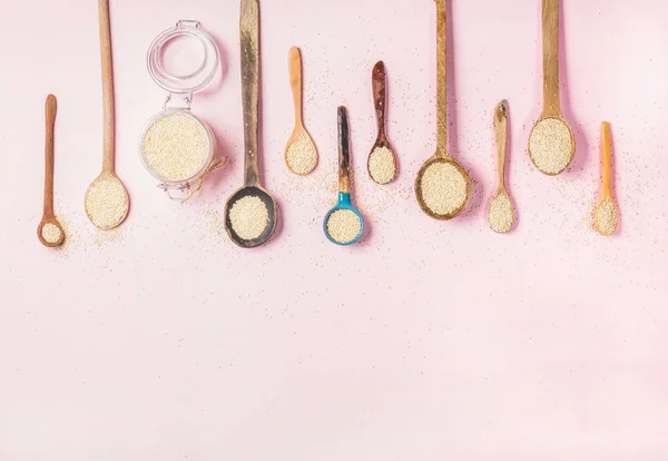 Quinoa seeds in spoons — Stock Photo, Image