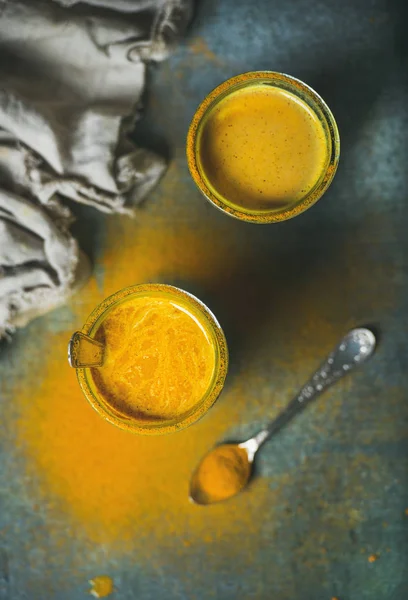 Golden milk with turmeric powder — Stock Photo, Image