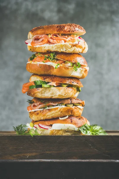 Bagels heap with salmon — Stock Photo, Image