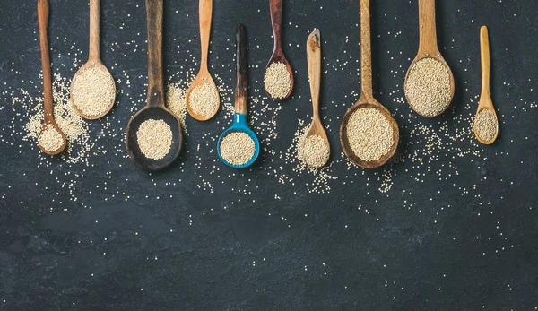 Quinoa seeds in spoons — Stock Photo, Image