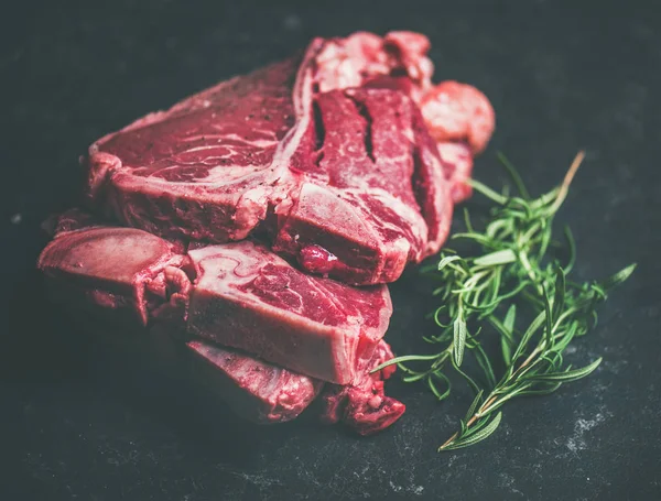 Raw beef meat t-bone steaks — Stock Photo, Image