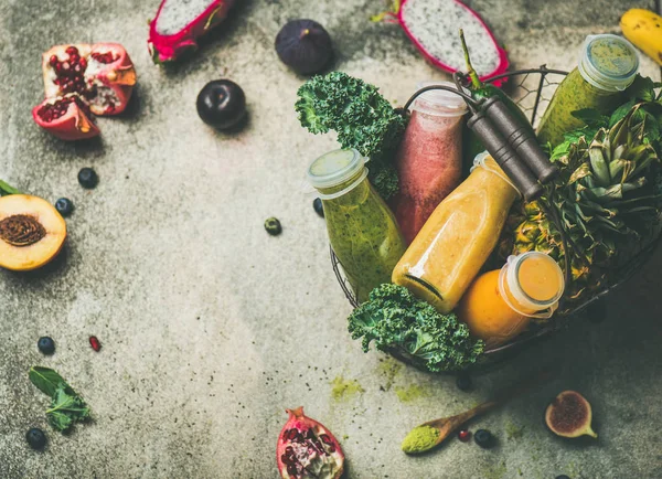 Colorful smoothies in bottles — Stock Photo, Image