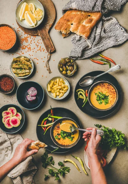 Turkish traditional lentil soup Mercimek and man eating from spoon — Stock Image Turkish traditional lentil soup Mercimek and man eating from spoon Royalty Free Stock Images