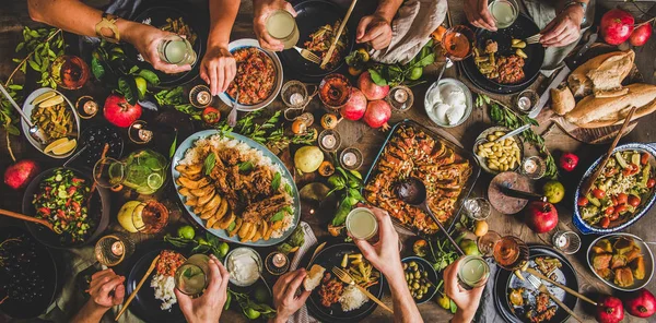 Flat-lay of family celebrating and having Turkish traditional meal — Stock Photo, Image