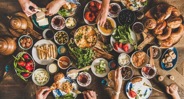 Turkish Breakfast Table Flat Lay Peoples Hands Taking Pastries Vegetables — Stock Photo, Image