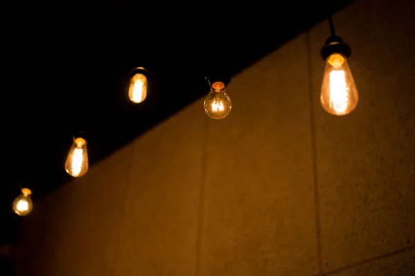 Edison Lamp Warm Light Sways Lightly Black Background — Stock Photo, Image