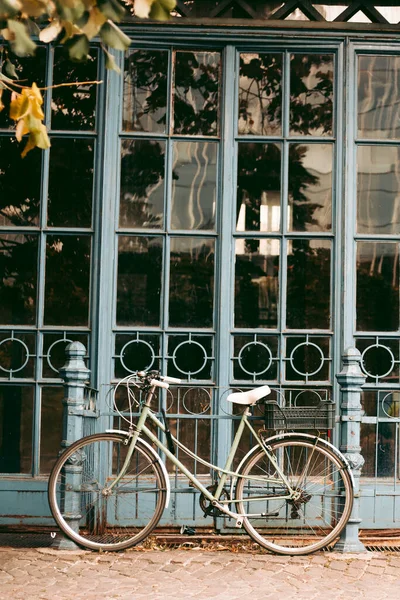 Old vintage walking bike in the city