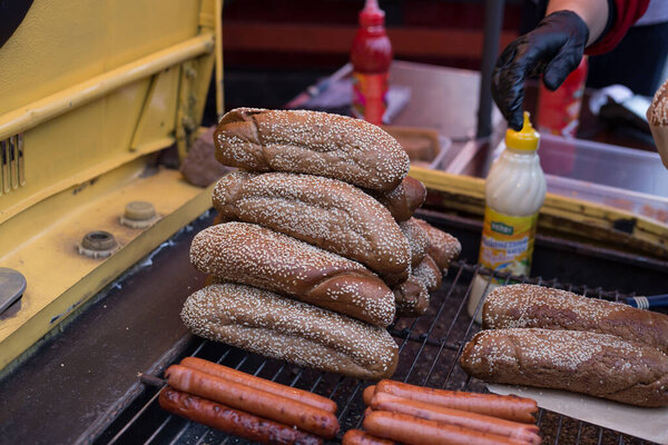 Delicious fresh hot dogs on the grill