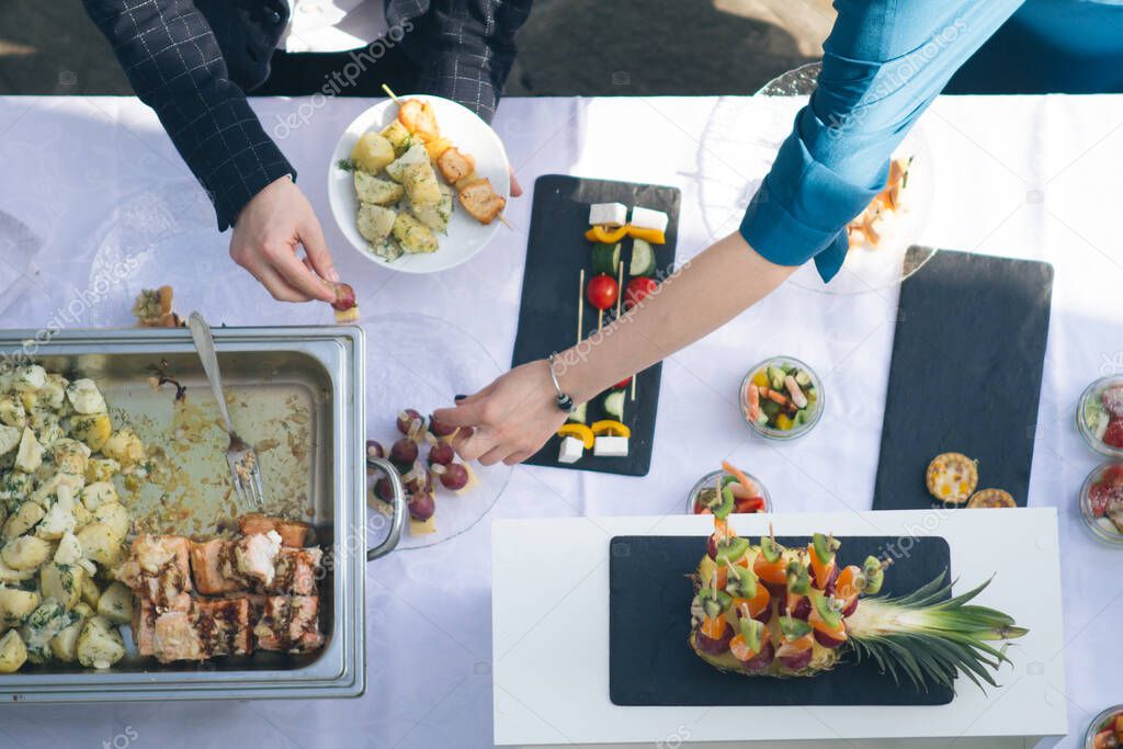 Delicious fresh wedding snacks on the table