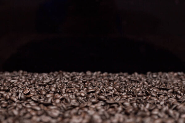 Roasted dark coffee beans background 